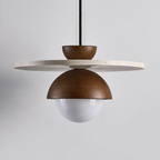 Modern pendant light with wooden and concrete design on a plain background