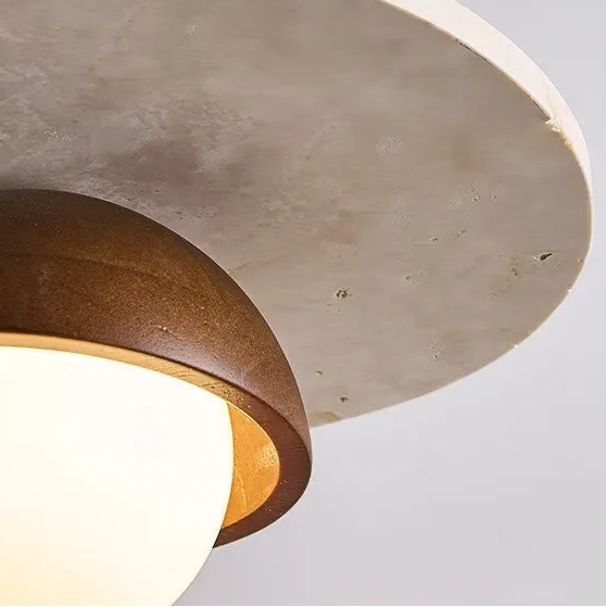 Concrete pendant light with natural off-white insole stone texture on a white background
