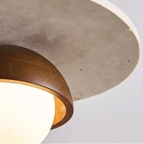 Concrete pendant light with natural off-white insole stone texture on a white background