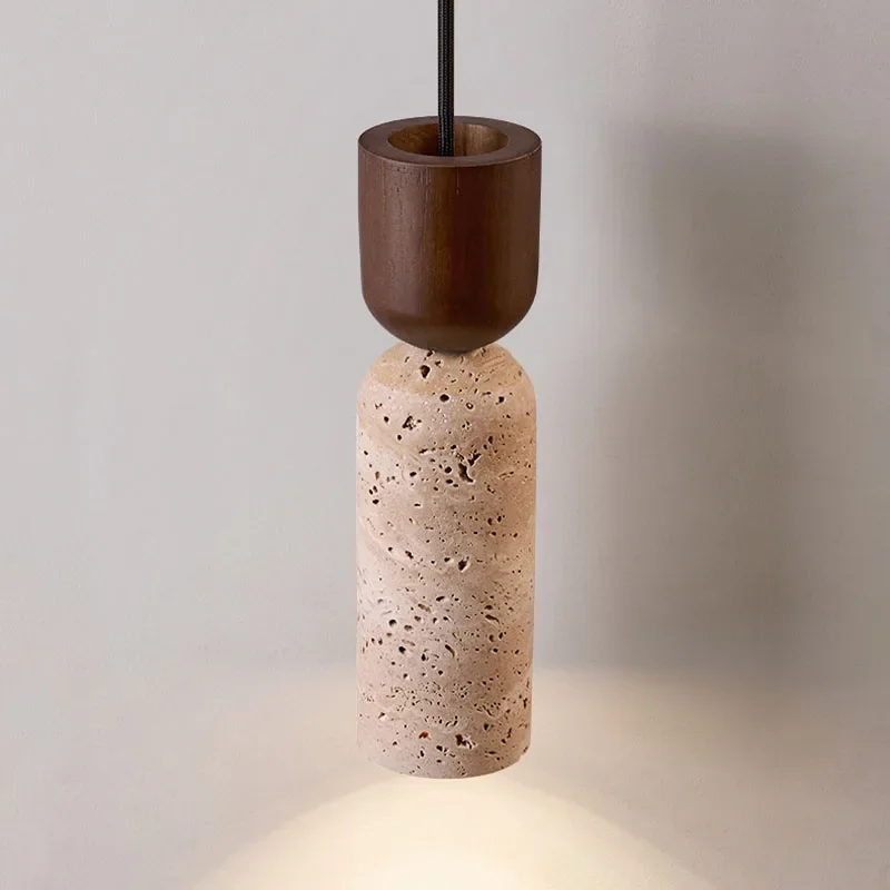 Pendant light with wooden top and terracotta base on a neutral background