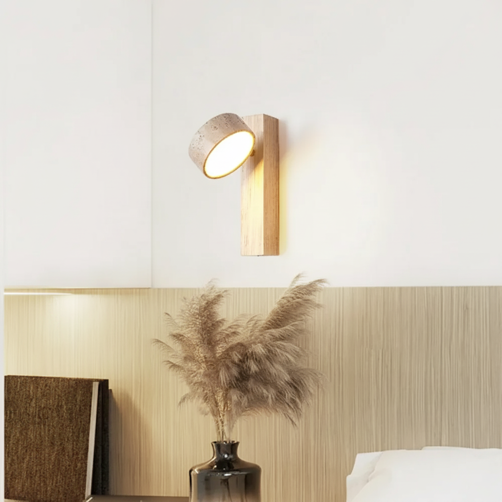 Wall-mounted light fixture on a wall with decorative elements