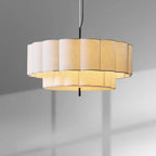 Modern pendant light with a geometric design on a gray background