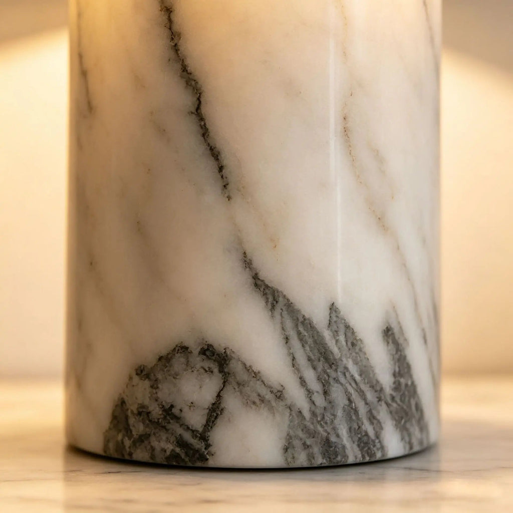 Marble-patterned cylindrical object on a neutral background