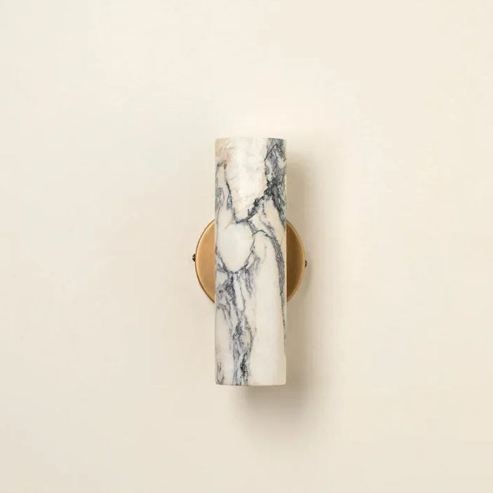 Marble-patterned wall sconce on a beige background