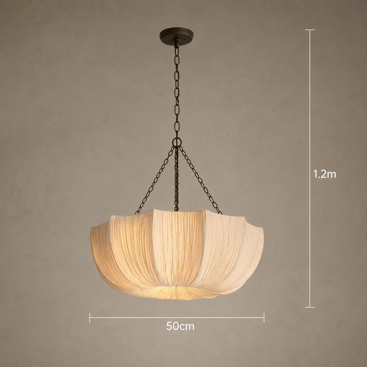 A hanging pendant light with a pleated cream fabric shade suspended by dark metal chains from a round ceiling canopy. White dimension lines on the image show the height as 1.