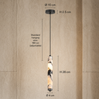 A hanging pendant light with a cylindrical marble-look shade in cream, black, and gray, suspended by a black cord. The image includes dimension labels and lines showing the canopy diameter of 10 cm, hanging wire length of 180 cm, shade height of 28 cm, and shade diameter of 4 cm, set against a textured beige wall.